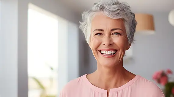 A patient with a healthy, confident smile — the kind of result Curodont™ helps protect by catching decay early
